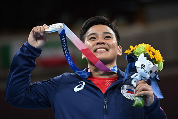 Tycoon Andrew Tan Rewards Olympic Silver Medalist Nesthy Petecio With A P10-M Suntrust Condo In Davao City